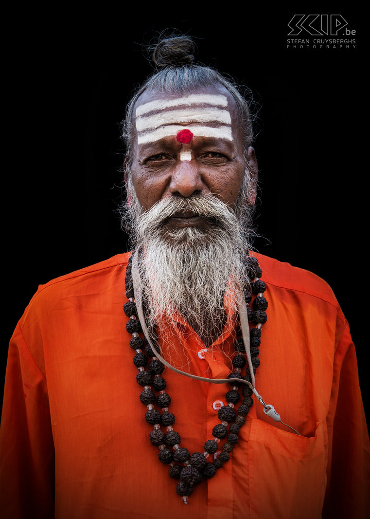 Hampi - Sadhu Hampi is also a the home to several sadhus who are supported by donations from local people and tourists. In Hinduism a sadhu (sanyasi) is a religious ascetic or holy man who left behind all material attachments and who focusses on the spiritual practice of Hinduism. They live in ashrams or temples, in simple huts or even in caves and forests. They often wear saffron-coloured clothing, symbolising their sannyasa (renunciation) and cover their face with ash and paint.  A lot of them use cannabis. Stefan Cruysberghs